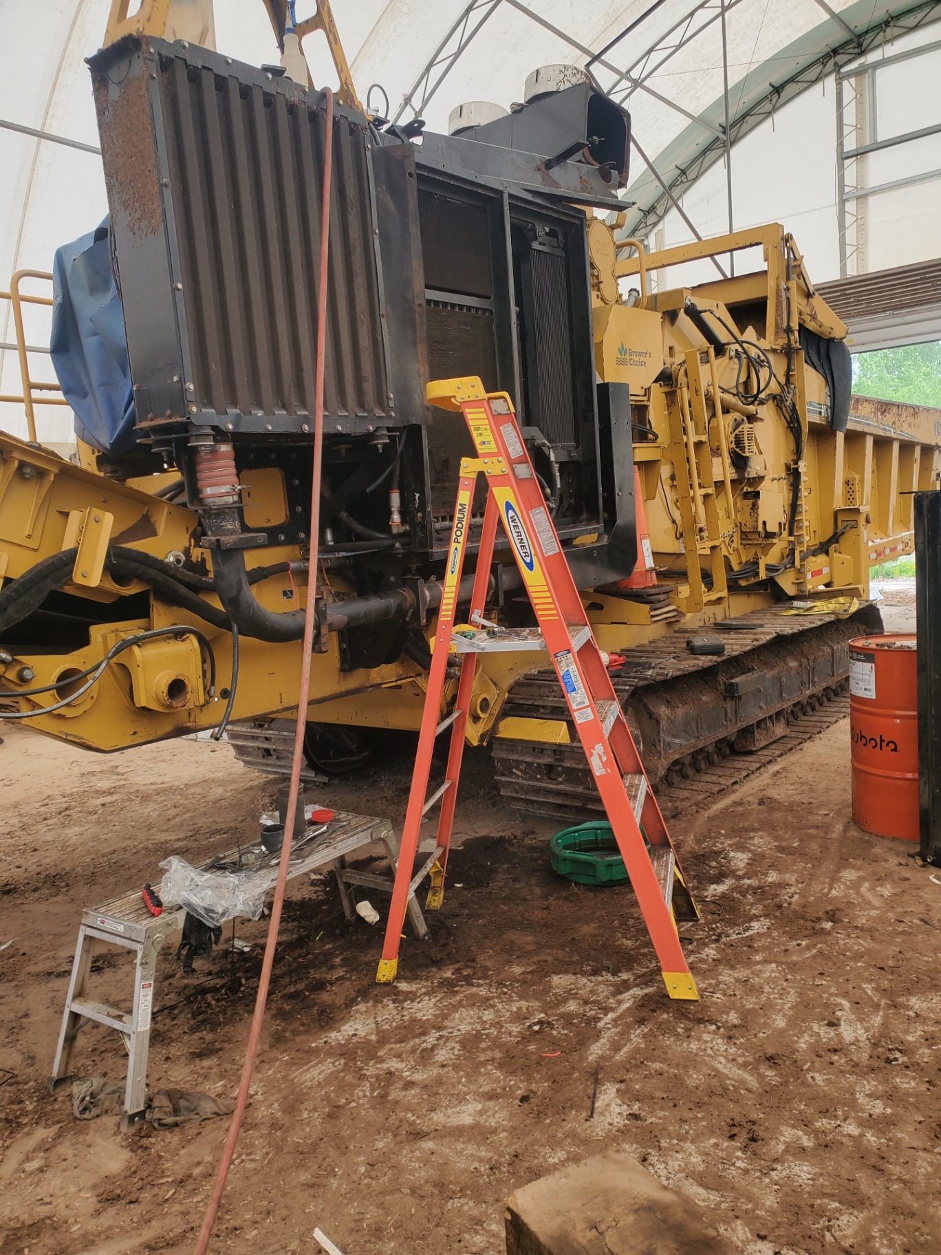 Mobile mechanic completing equipment repair work
