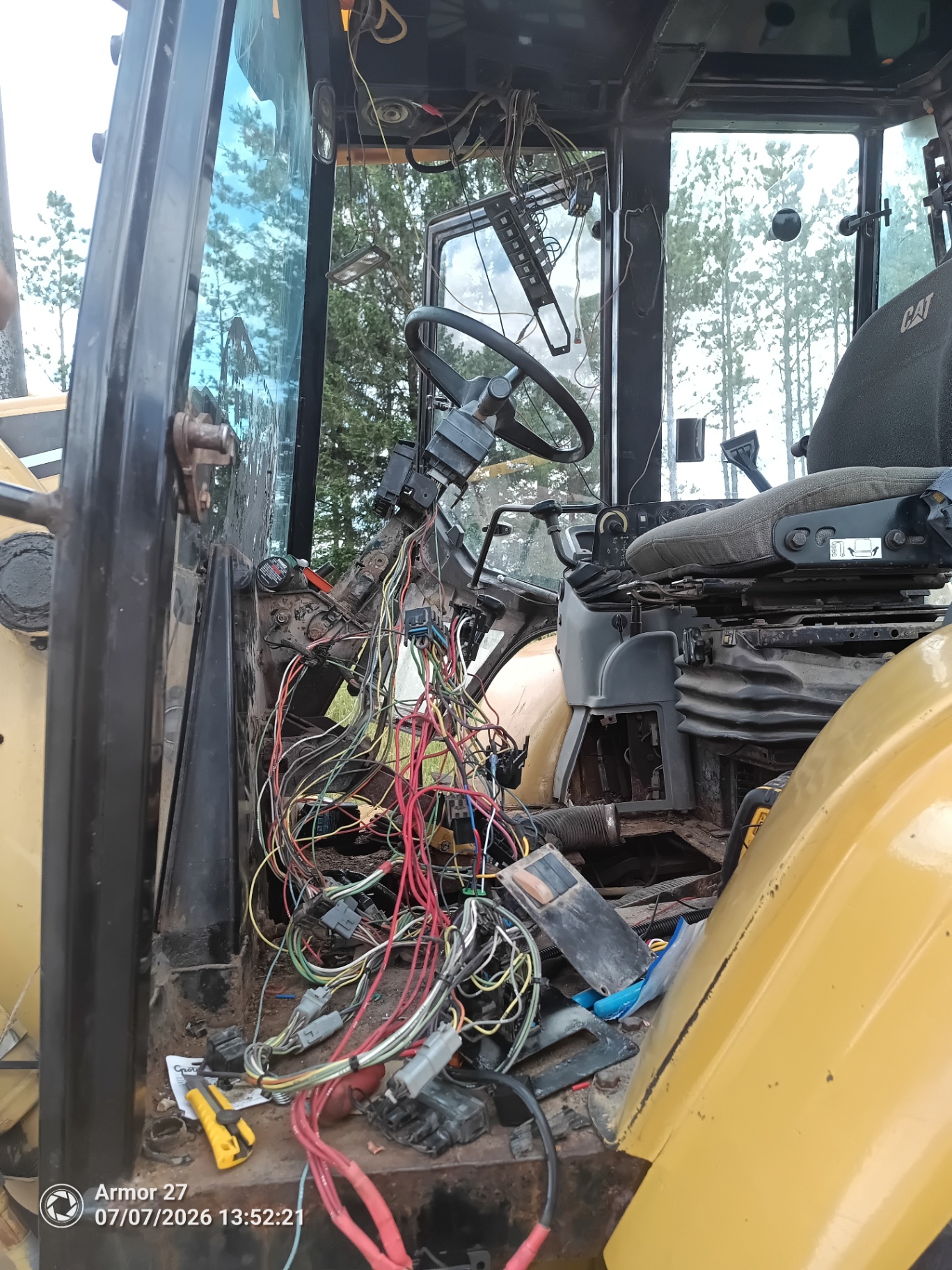 Heavy equipment being serviced in the field